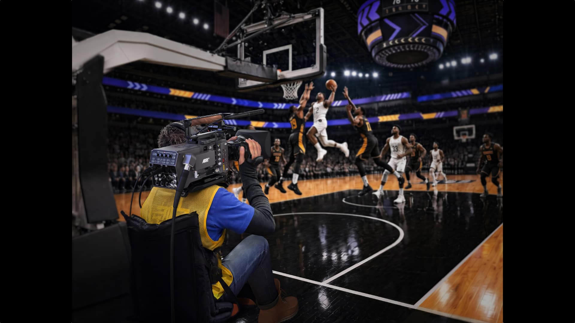 ARRI ALEXA 35 Live Xtreme on a broadcaster's shoulder rig capturing a live basketball game courtside