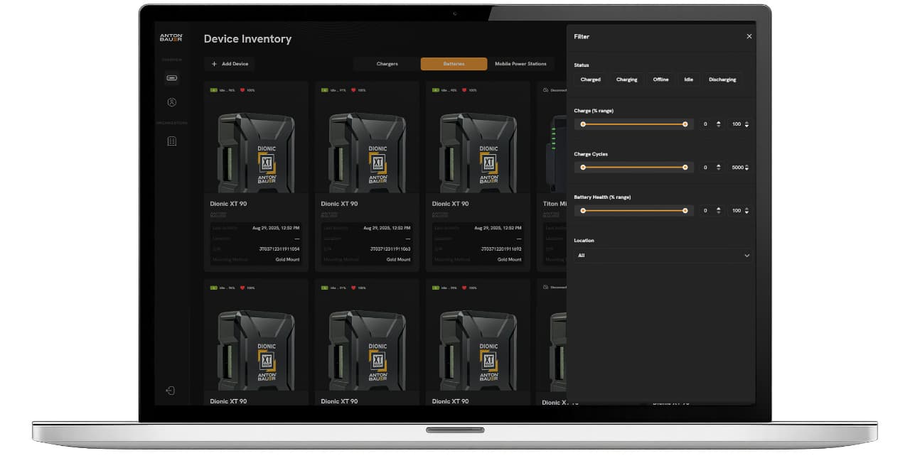 The image displays a laptop screen showing an Anton/Bauer Fleet Management 'Device Inventory' management interface on a webpage. It features a list of devices, each with an image of a hard drive, the device name, and its status. The statuses include 'On' and 'Off', with some devices having a 'Last Checked' timestamp. The interface suggests a system for monitoring and managing the status of multiple hard drives.