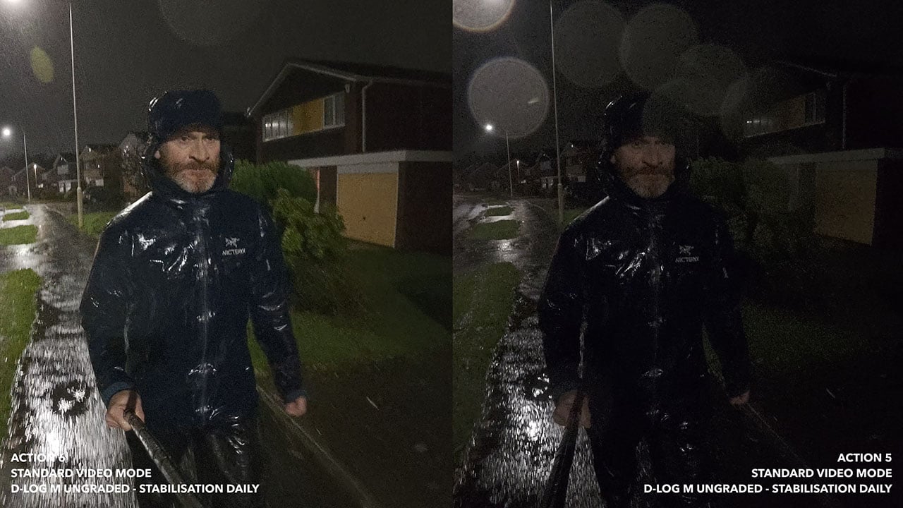 The image features a person walking in a rainy, nighttime setting. They are dressed in a waterproof jacket and hat, holding an umbrella. The background includes residential buildings and streetlights, with visible rain and reflections on the wet pavement. The scene has a moody and atmospheric feel due to the dark conditions and weather. The image is likely a side-by-side comparison showcasing different video modes or settings.