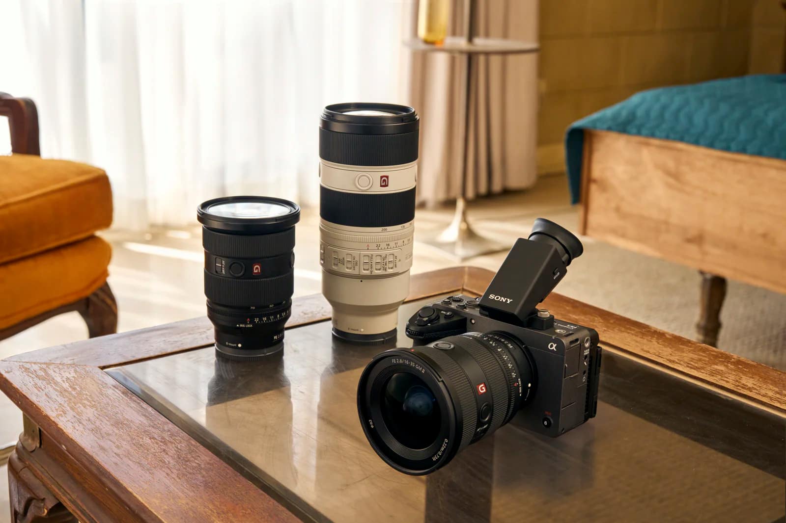 Sony FX5 with detachable EVF and 16-35mm GM lens beside two additional G Master lenses