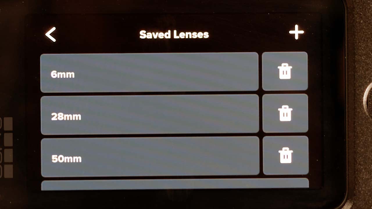 GoPro Mission 1 Pro ILS screen showing the Saved Lenses menu listing 6mm, 28mm, and 50mm entries