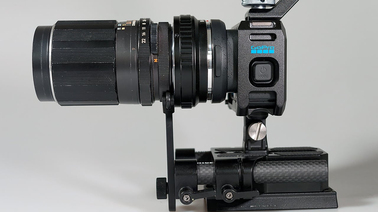 GoPro Mission 1 Pro ILS with a vintage telephoto lens and additional lens support bracket fitted