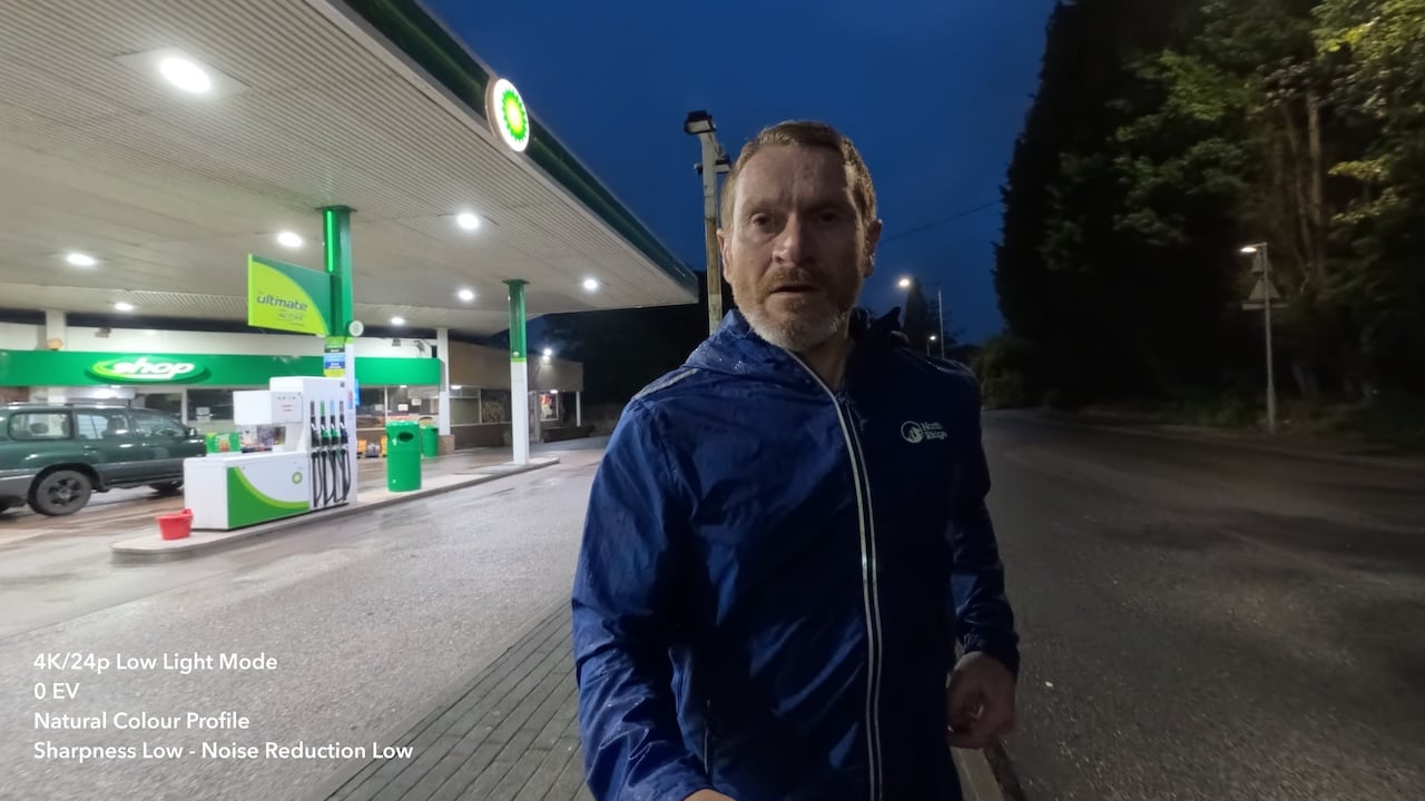GoPro Mission 1 Pro low light mode test shot compared with Insta360 Ace Pro 2 in dimly lit outdoor scene