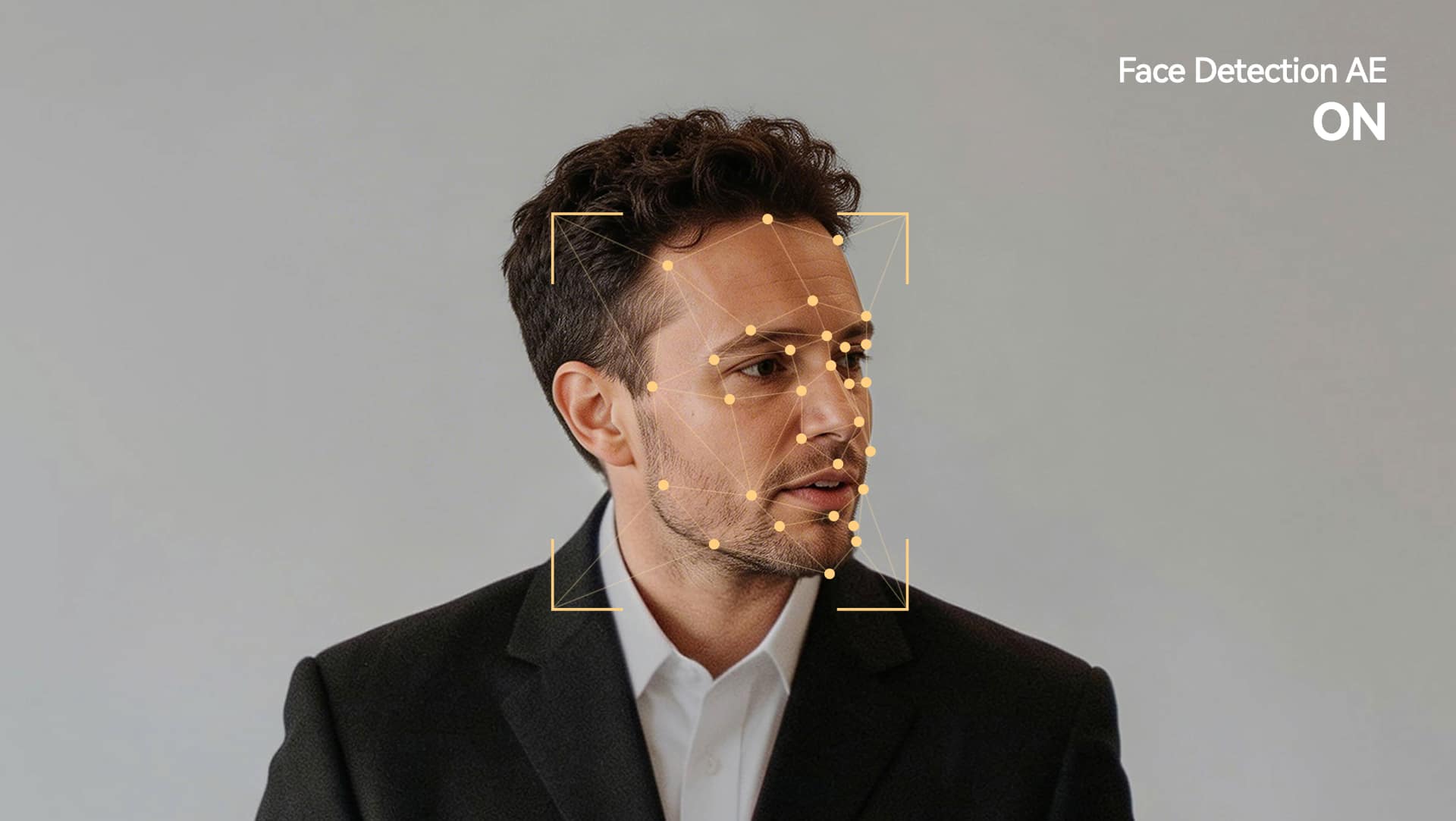 Hollyland Astra P1 Face Detection AE showing facial landmark tracking overlay on a subject in a dark jacket