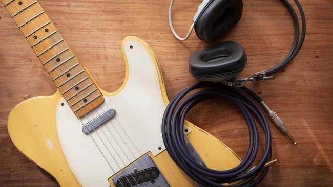 While my guitar gently collaborates... Shutterstock