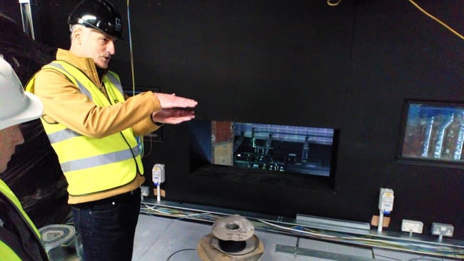 A new projection port has been cut as close as possible to floor level, to allow the projectors to be as square to the screen as possible.jpg