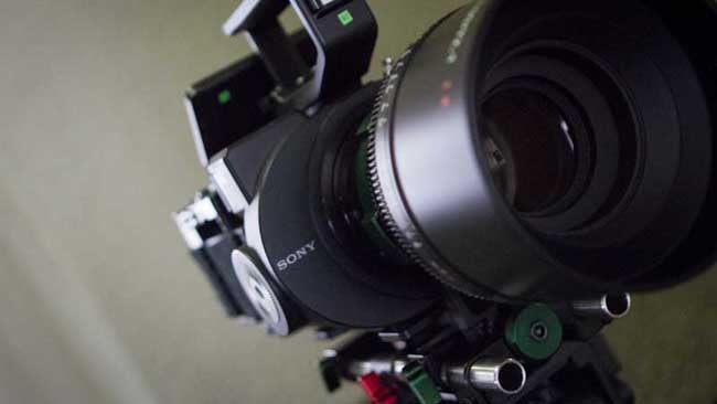 An FS700 in its natural habitat, hiding behind a massive cinema lens.jpg