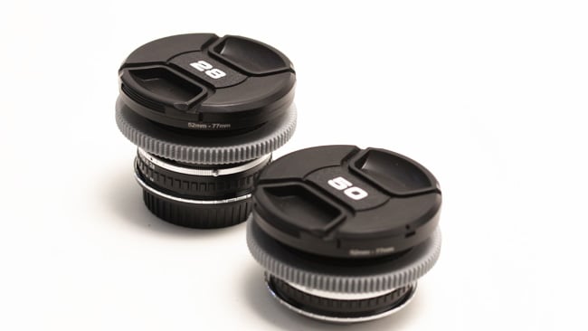 At short focal lengths, engineering concerns can start to increase sizes again. The 28mm Nikon Series E is larger than the 50mm