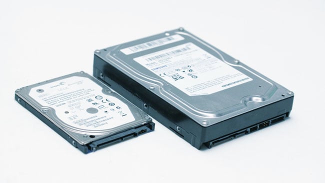 Both of these are hard disks. Flash  SSDs are often the same size and shape as the smaller drive. All of them  use the same data and power connectors_ the system doesn't care 