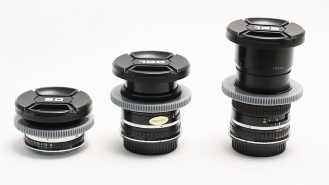 Lenses generally get longer with  increasing focal length. Here stills lenses. L-R, the Nikon Series E 50mm,  100mm and 135mm 