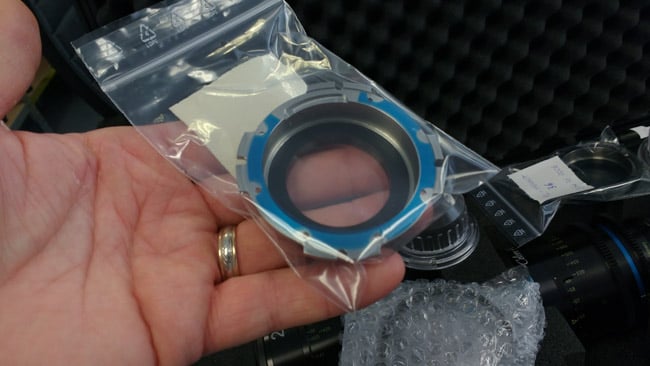 Microscopically-thin plastic shims can be used to adjust the mount of a lens to suit a particular camera, as shown here on a Celere
