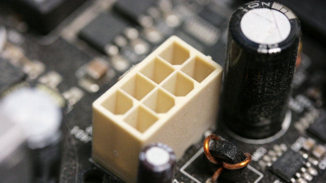 Most motherboards and graphics cards need extra power, supplied by sockets roughly like this. The power supply must have appropriate connectors.JPG