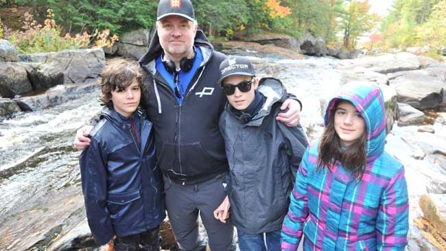 On the set of Against the Wild III - The Journey Home. L-R Zackary Arthur, playing Max Davis, Richard Boddington, and Elliott Boddington, his son, and Morgan Dipietrantonio playing Erin Davis.jpg