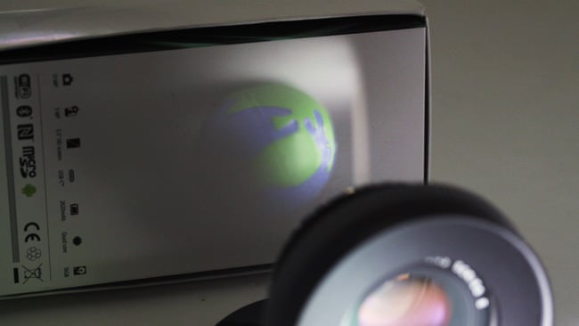 The Nikon Series E 50mm f 1.8 lens projects an image big enough to cover a 35mm stills frame, though it is enlarged even more here by the extra projection throw