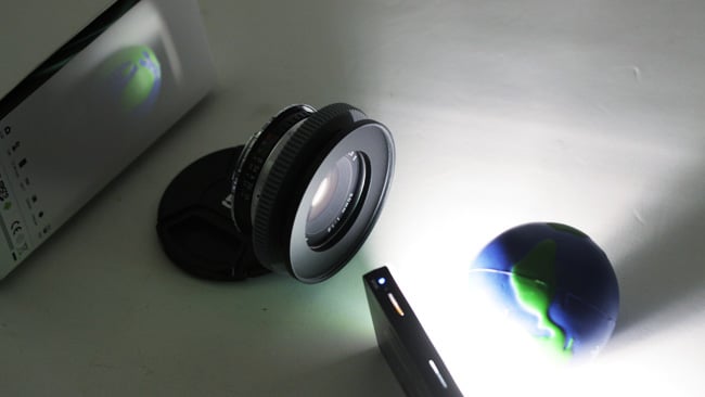 The experimental setup. The projected image is further from the lens than normal, effectively putting the setup in macro, so the lens can focus on such a nearby image