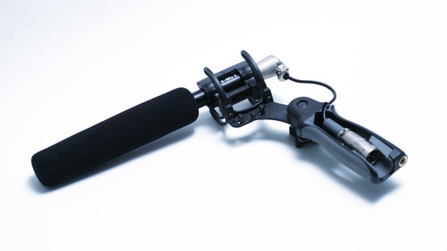 The foam cover and grip are supplied (the short XLR link is third-party). A furry windjammer is available for a small additional charge