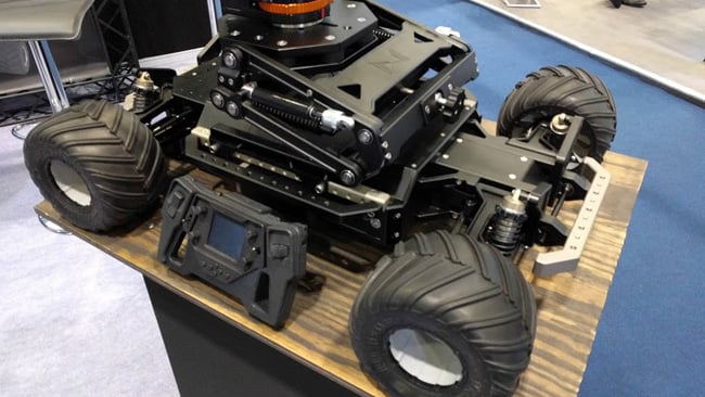 This might look like a giant radio-controlled car, and it sort of is, but it also provides some multi-axis isolation for its gimbal (not shown, above the chassis).jpg