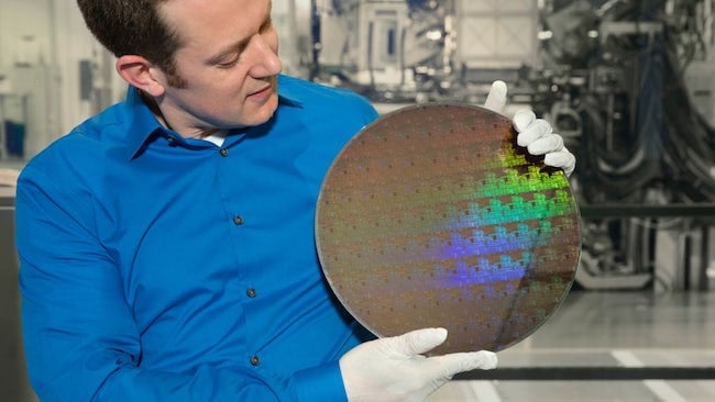 IBM's Nicolas Loubert holds a wafer of the new 5nm chips IBM