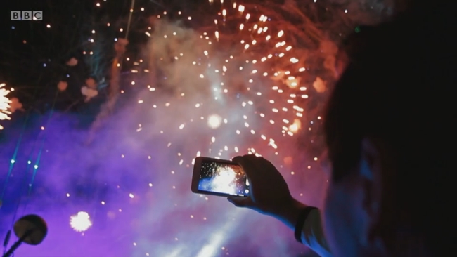 This fireworks display is well-imaged, though the in-shot phone screen is overexposed BBC