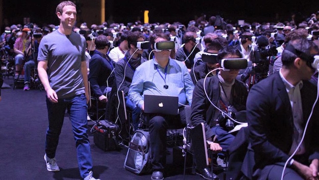 How to be one of world's most famous people and walk through a room of journalists unnoticed... Mark Zuckerberg