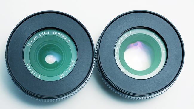 f-number is the ratio between the  focal length and the entrance pupil, which basically means the hole through  the lens as viewed through the front elments 