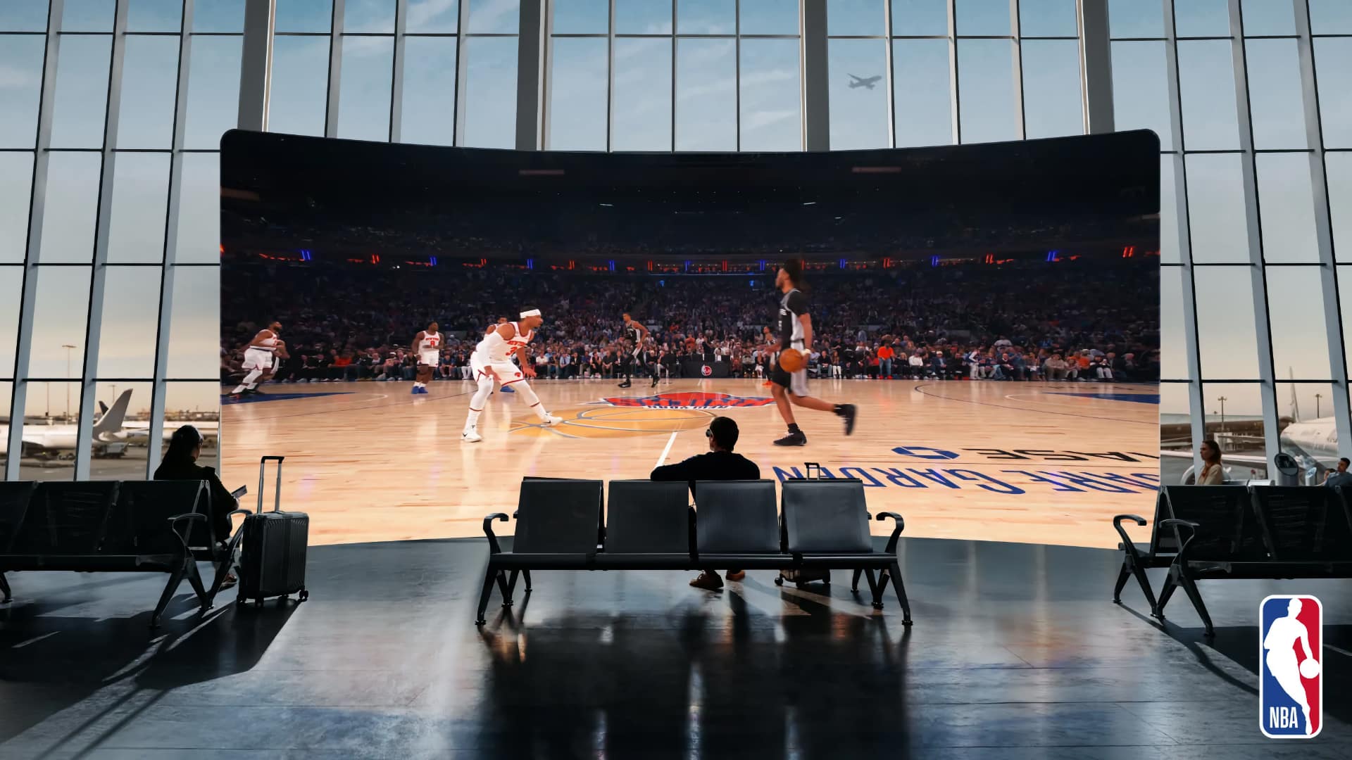 Meta VR Glasses wearer watching an immersive NBA game on a curved virtual screen in an airport lounge