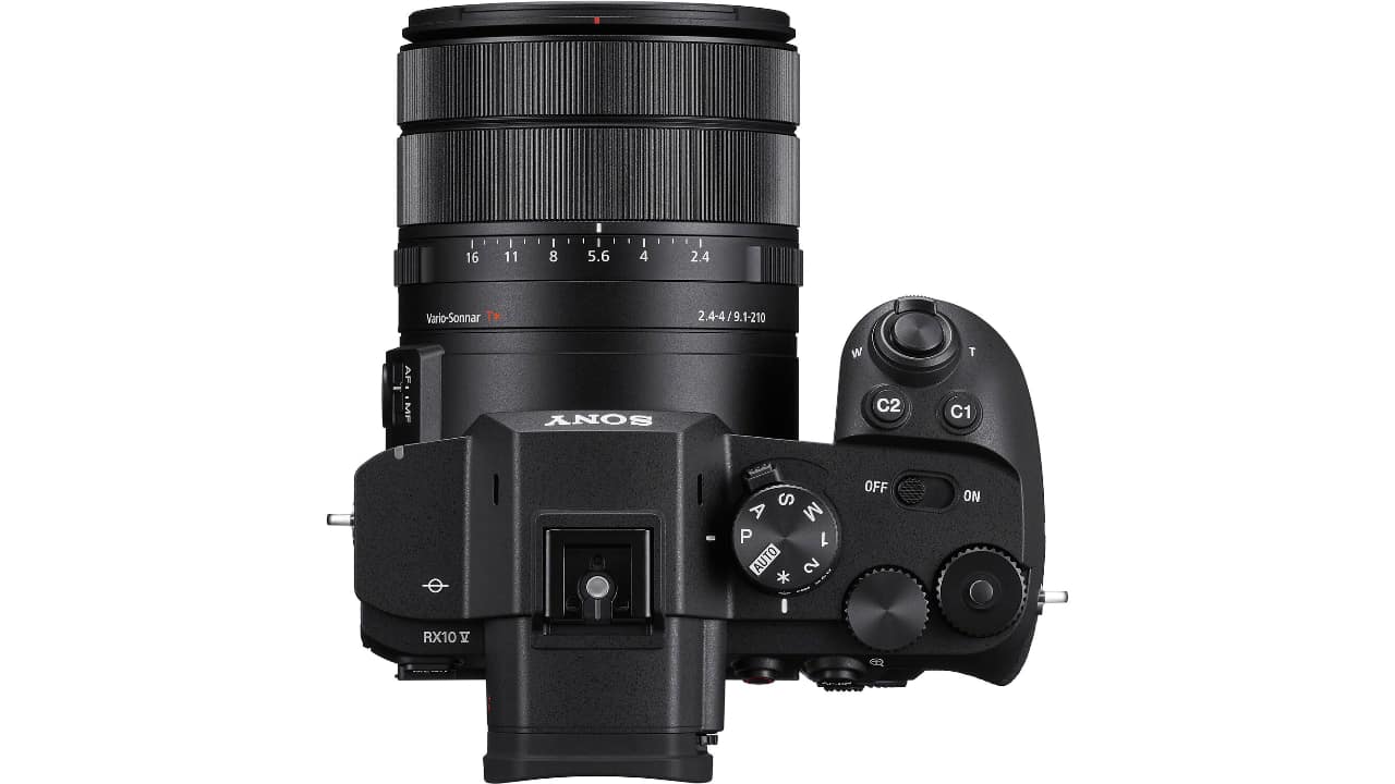 Sony RX10 V top view showing mode dial, C1 and C2 custom buttons, hot shoe and zoom rocker