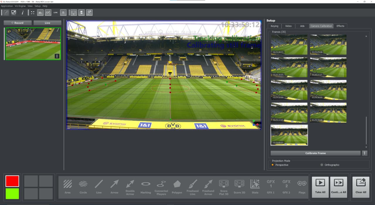 The image is a screenshot of the Viz Arena 6 software interface, with a toolbar at the top displaying various tools and options. The main area of the interface shows a large preview window with a live video feed of an empty stadium. Below the preview window, there are multiple thumbnail previews of the same scene from different angles, indicating a sequence of video clips or frames. The right side of the interface contains a panel with additional thumbnails and settings, likely for adjusting video properties and effects. A small thumbnail in the bottom left corner shows the same stadium scene, possibly for quick selection or reference.