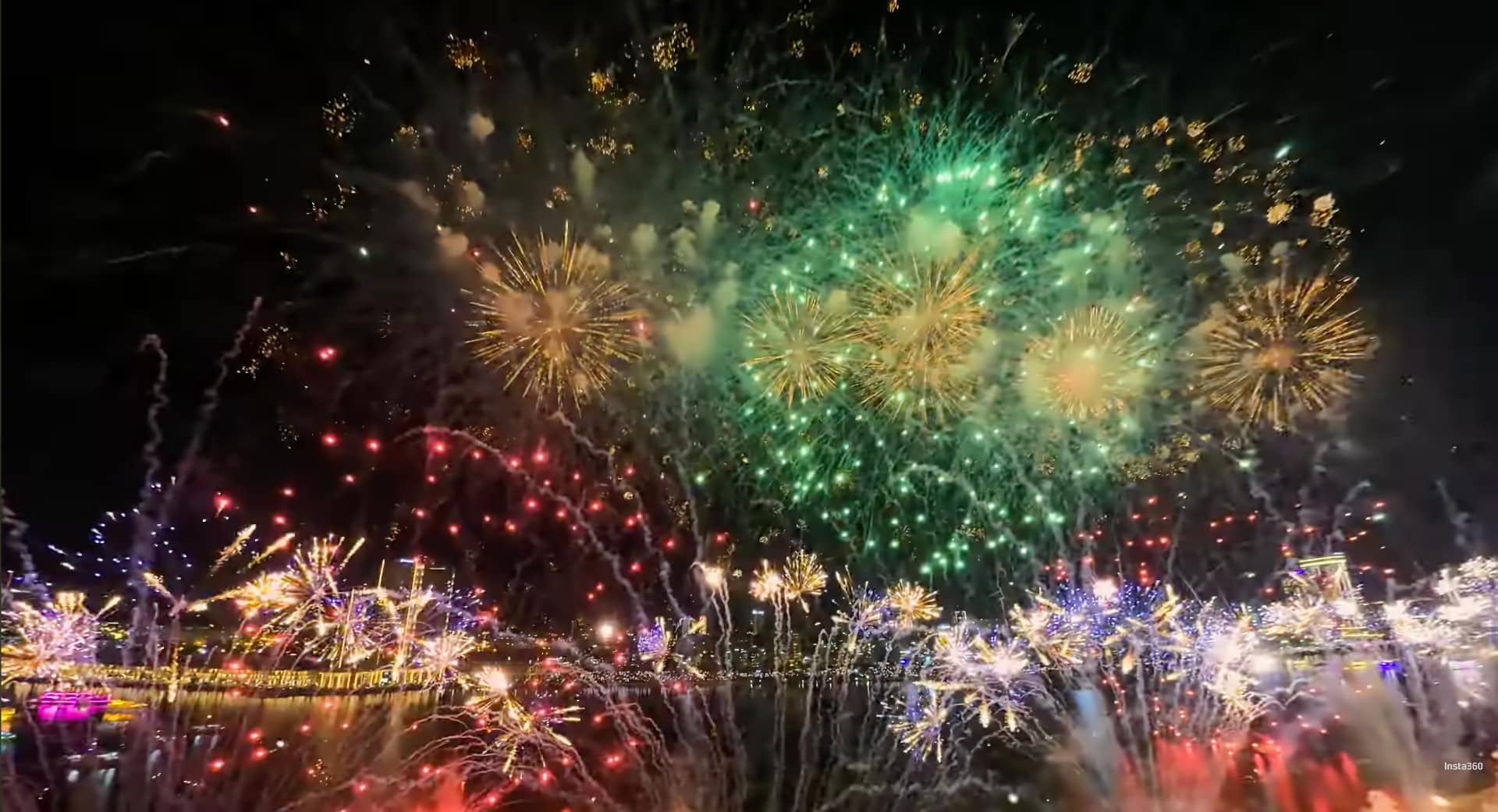 Insta360 X6 teaser sample footage of a fireworks display over a city skyline at night