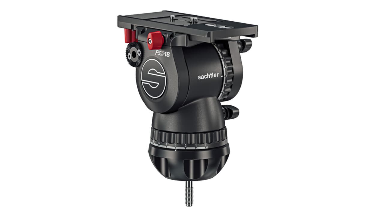 A black Sachtler fluid tripod video head with adjustment knobs and a mounting plate, featuring branding and a threaded bolt at the base for tripod attachment.