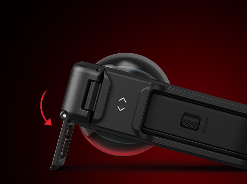 Close-up of a black device with an adjustable kickstand, shown partially extended with a red curved arrow indicating its movement, set against a dark red gradient background.