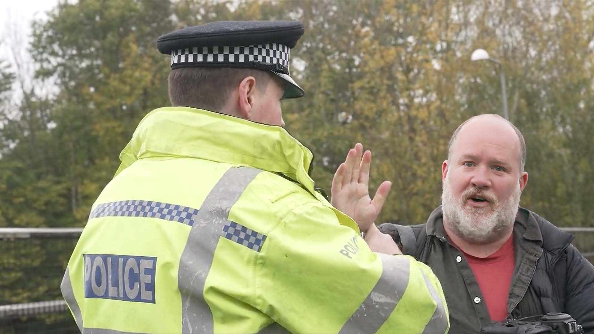 Journalism isn't a crime. Rich Felgate pleads with a police officer whilst covering the Just Stop Oil protests.