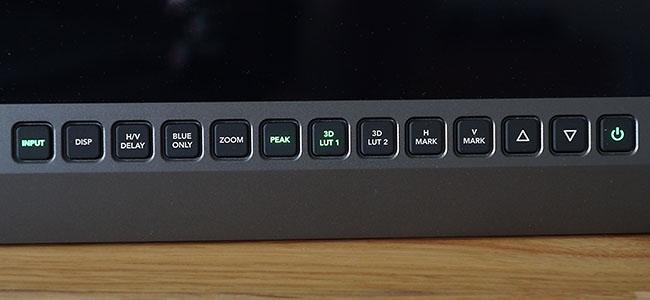 Illuminated buttons on the Blackmagic Design SmartView 4K monitor.