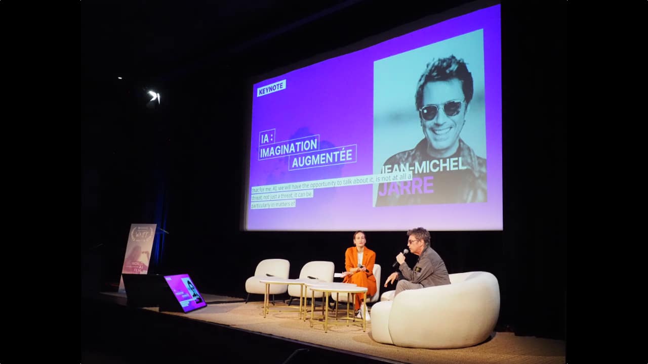 Jean-Michel Jarre speaking on stage at the inaugural World AI Film Festival (WAIFF) held in Cannes