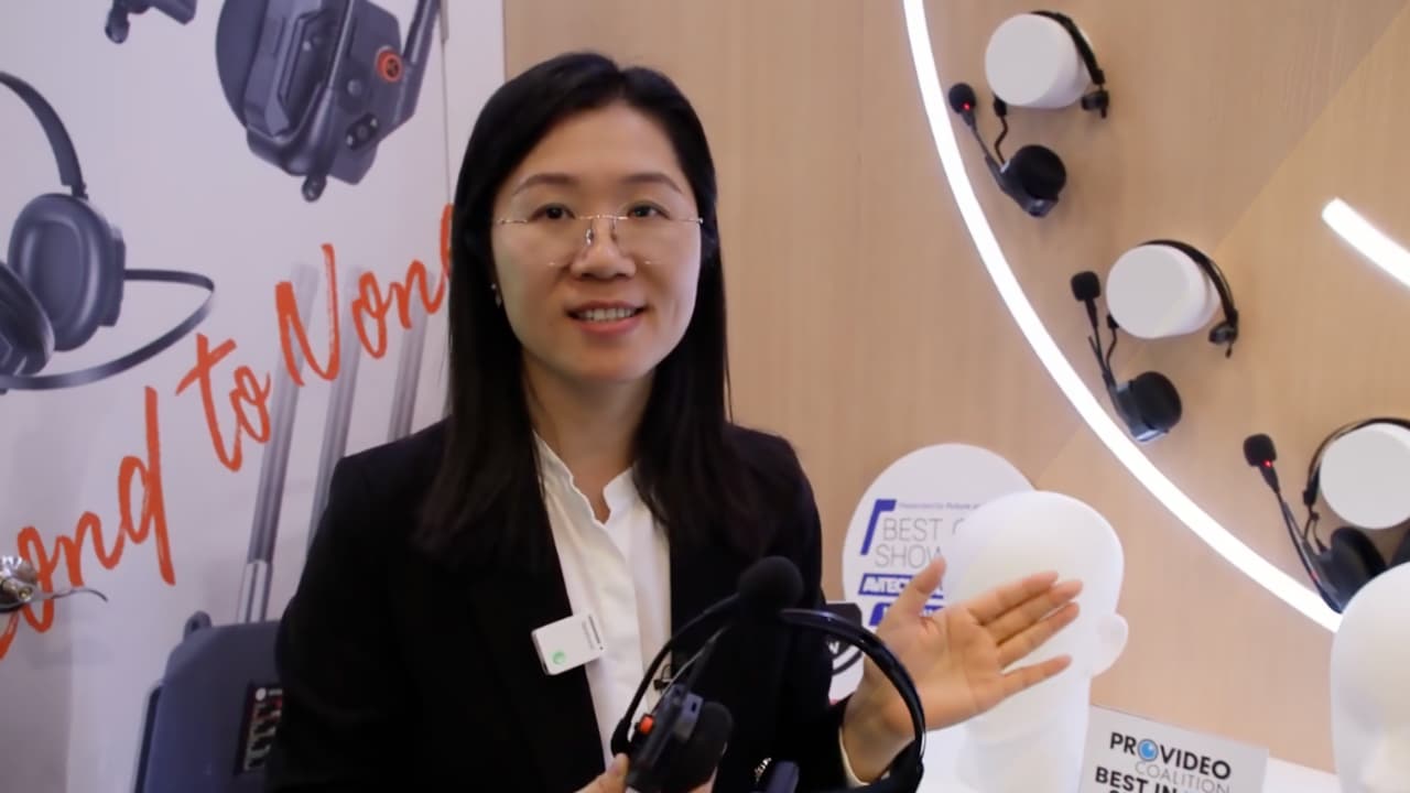 Saramonic's Direct of Sales, Diana Wu, shows off the innovative WiTalk9 X