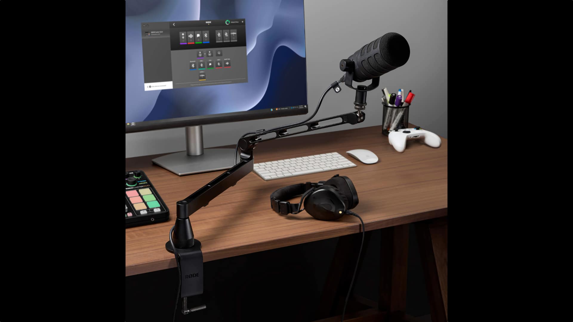 The low-profile RØDE LPA1 studio arm keeps everything you want out of shot out of shot